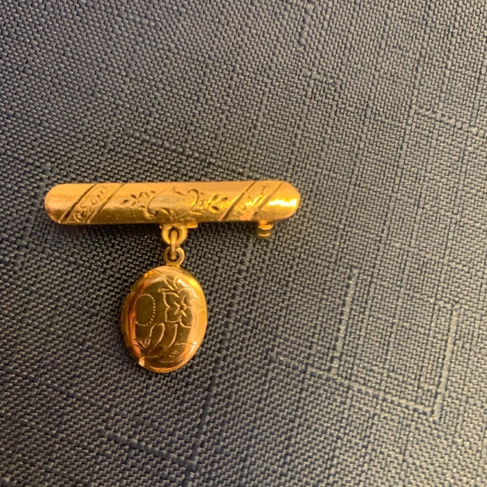 Vintage etched brooch